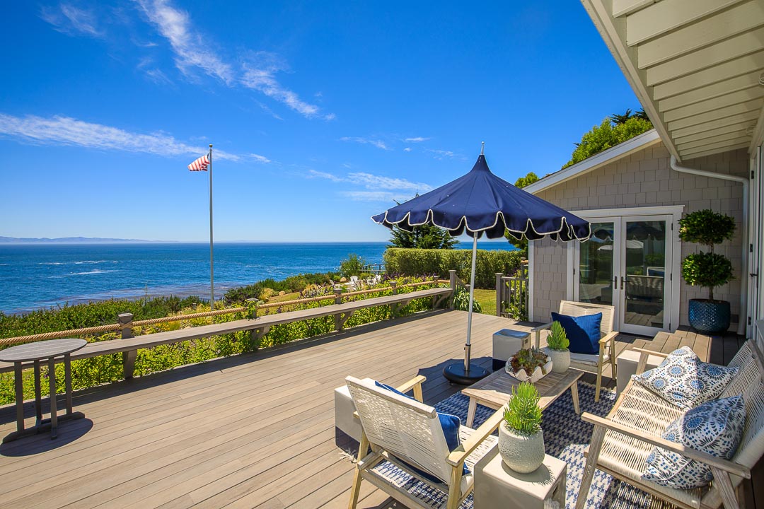 Ocean-view deck with lounge seating overlooking the Santa Barbara coastline.