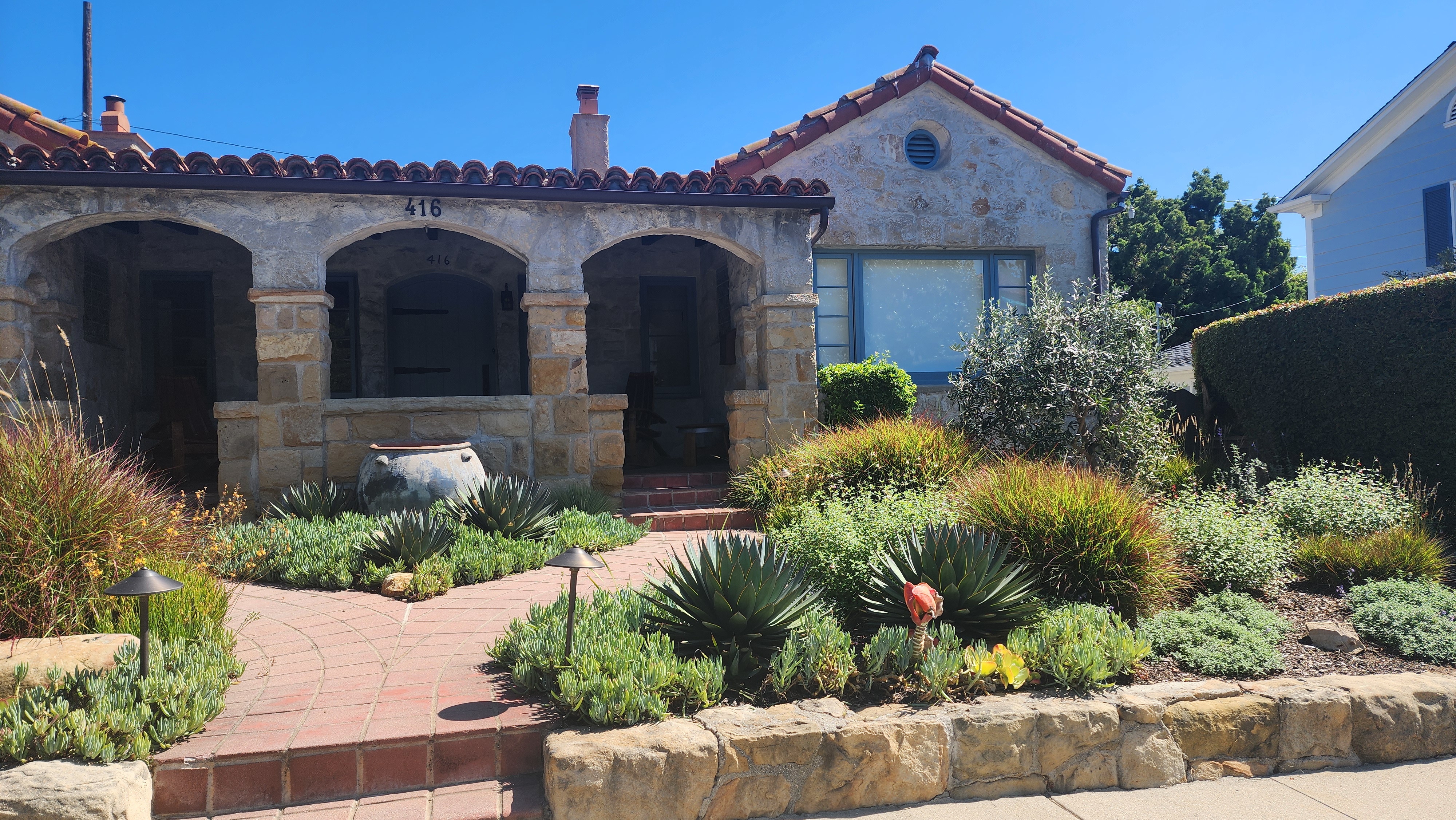Drought-tolerant xeriscape front yard in Santa Barbara.